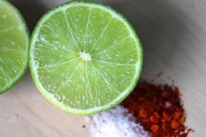 Persian lime with salt and Cayenne pepper photo