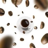 Cup of coffee and coffee beans in flight on white background photo