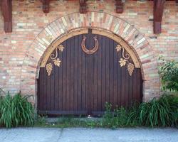 Wooden gate and horseshoe photo