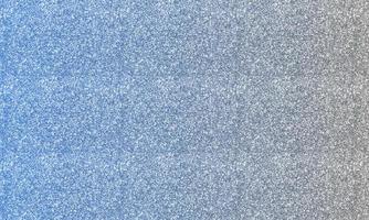 textura abstracta plateada con fondo de brillo de color degradado azul. foto