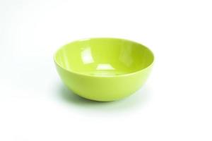 Green bowl isolated on white background photo