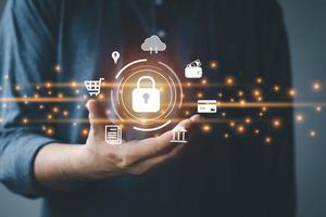 cyber security concept, man hand that is designed to protect networks, devices, programs and data from attacks, damage or unauthorized access. photo