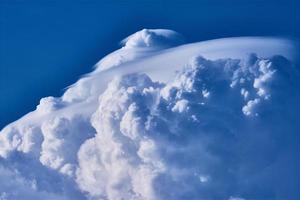 cumulonimbus clouds against blue sky photo