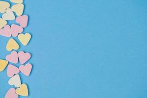 candy hearts blue background photo