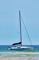 sailing ship is lying in front of Benodet coast, a small town in Brittany, France photo