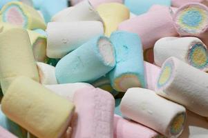 blue, pink, white and yellow marshmallows as background photo