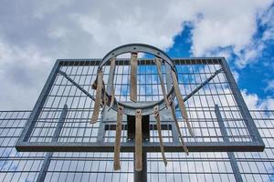 basketball basket for children on a football ground against blue cloudy sky, Germany photo