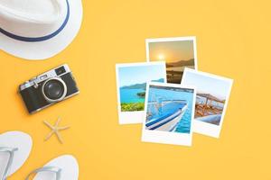 Travel photos on yellow surface with traveler accessories and camera beside