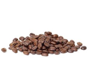 Roasted coffee beans isolated on white photo