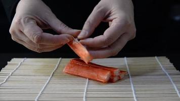 Chef preparing sushi roll - people with favorite dish Japanese food concept video