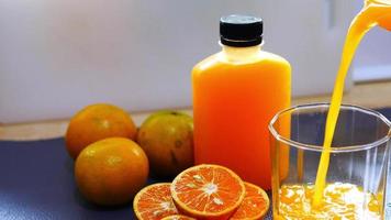 Homemade fresh orange juice squeezing process video