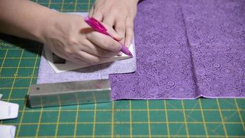 Woman making cloth mask for virus protection during Covid-19 spreading period video