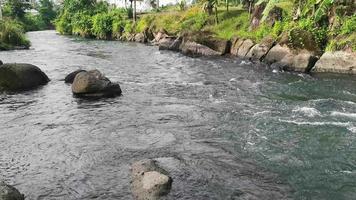 Steady shot of stream of water. Sport rafting on rivers. Beautiful view of flowing river water video
