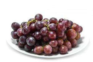 Grape and grape juice on the white background photo