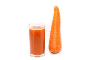 glass of carrot juice and fresh carrots isolated on white photo