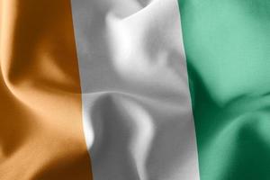 3D rendering illustration flag of Ivory Coast. Waving on the win photo