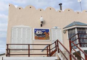 Artistic details of a house in front of Quequen beach photo