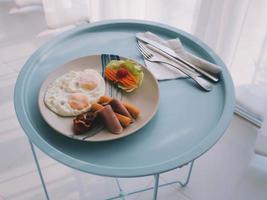 morning breakfast set on small table photo