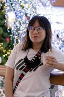 woman holding boba milk tea photo