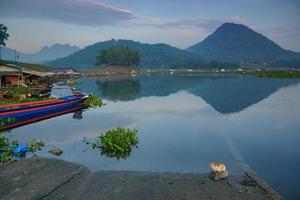 Beautiful landscapes with mountain and reflection on the lakes. Perfect for wallpaper or natural background. Moody calm morning. Free photo