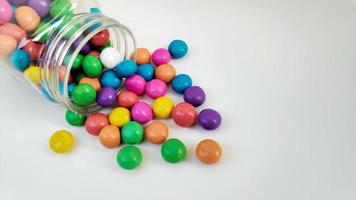 pile of colorful candies in a container photo