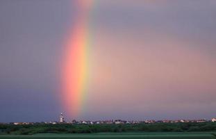 Rainbow above village in Serbia photo