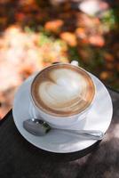 latte art coffee with heart shape photo