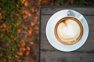 latte art coffee with heart shape photo