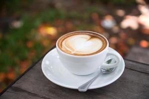 latte art coffee with heart shape photo