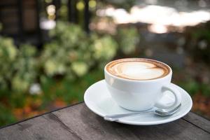 latte art coffee with heart shape photo