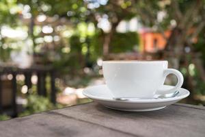 a cup of coffee in coffee shop photo