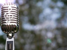 Microphone image used for advertisement. Background is bokeh. photo