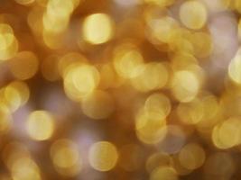 imagen de fondo de bokeh dorado y plateado. foto