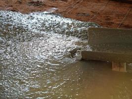 Pour the finished cement in a medium area. photo