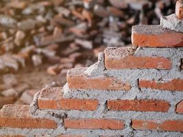 A brick wall being built. photo