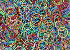 A small rubber band in various colors, put together. photo