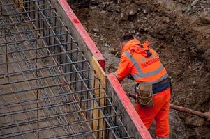 Oltre il Colle Colle Bergamo Italy 2017 Carpentry workers to build sewage purifiers photo