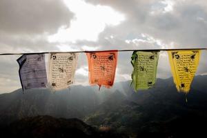 Colored flags with printed prayers of good luck photo