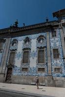 Beautiful and old tiled facade of Capela das Almas church in Porto, Portugal on a sunny day in summer 2022. photo