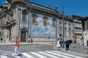 Beautiful and old tiled facade of Capela das Almas church in Porto, Portugal on a sunny day in summer 2022. photo