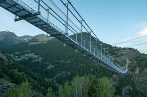 The longest Tibetan bridge in Europe, 600 meters long and 200 meters high in the Canillo Parish in Andorra photo