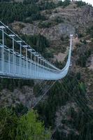 The longest Tibetan bridge in Europe, 600 meters long and 200 meters high in the Canillo Parish in Andorra photo