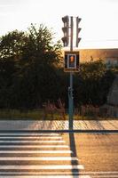 Red traffic lights and pedestrian crossing photo