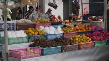 Ponorogo, Jawa Timur, Indonesia- 01-02-2020  People who are transacting in traditional markets with a variety of merchandise. Local products and imported products are the products of choice for buyers photo