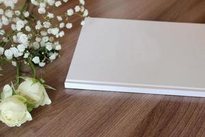 Blank white book, journal, wedding guestbook, notebook mockup photo
