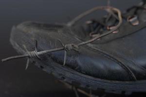 Military boots with Barbed Wire, military concept photo