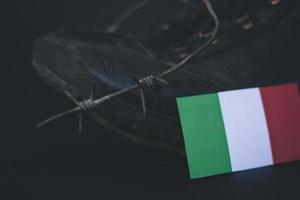 Italy army, military boots flag Italy and  Barbed Wire, military concept photo