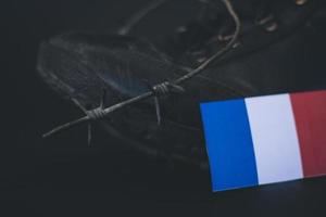 France army, military boots flag France and Barbed Wire, military concept photo