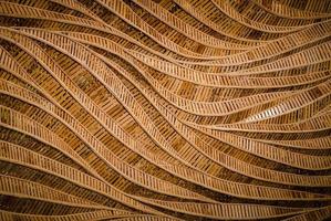 fondo de naturaleza de superficie de bambú de textura de tejido artesanal marrón foto