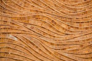 nature background of brown handicraft weave texture bamboo surface photo